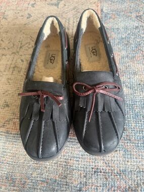 UGG Black Moccasin Slippers with Brown Accent Laces
